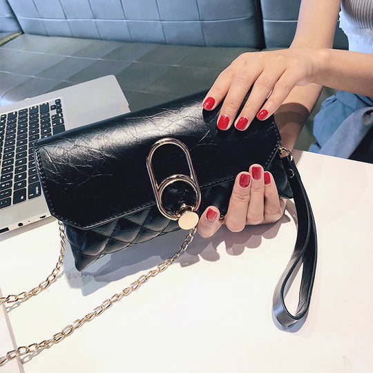 Damen Clutch aus strukturiertem Kunstleder mit eleganter Kettenverzierung Nord Taschen
