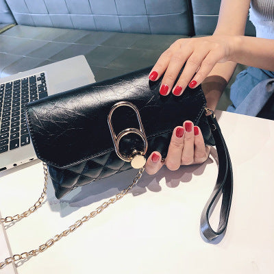 Damen Clutch aus strukturiertem Kunstleder mit eleganter Kettenverzierung Nord Taschen
