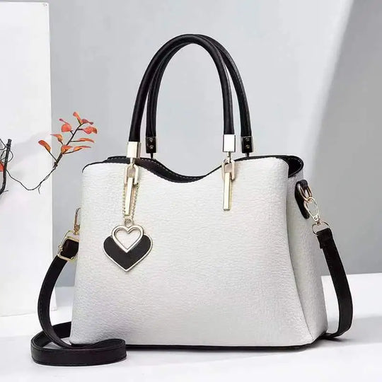 Nord Taschen | mit Herzanhänger - Stilvolles Design und praktischer Schulterriemen