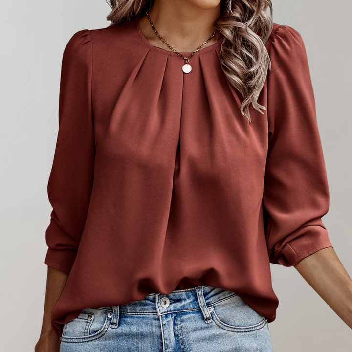 Damenbluse mit Falten und Puffärmeln