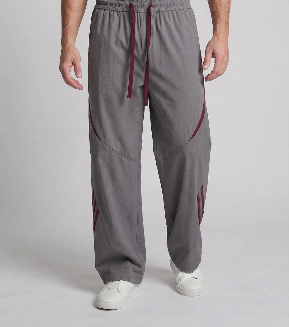 Herren Extra Breite Nylon Jogginghosen im Baggy-Schnitt mit Kordelzug, dekorativen Paneelen und seitlichen Kontraststreifen Nord Taschen
