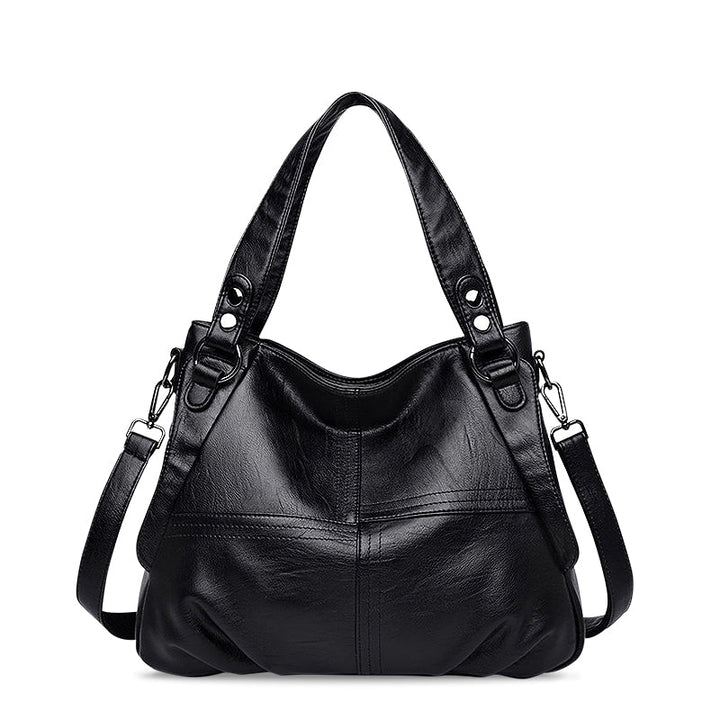 Nord Taschen | Große vegane Kuhfell-Hobo-Schultertasche