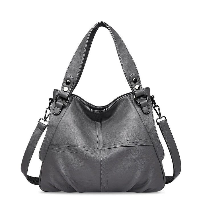 Nord Taschen | Große vegane Kuhfell-Hobo-Schultertasche
