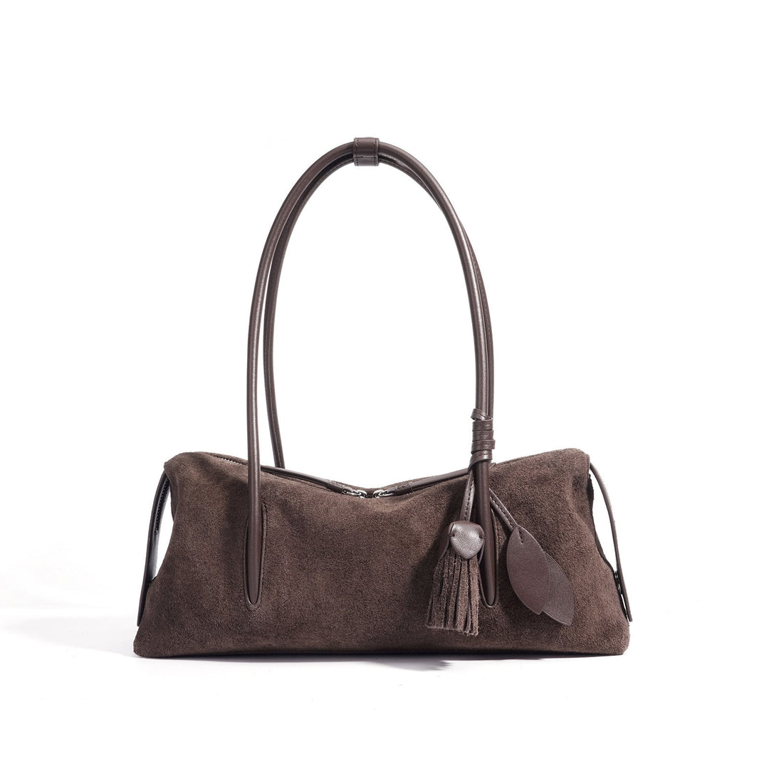 Nord Taschen | Damen Schultertasche mit Quaste und Blattanhänger Detail