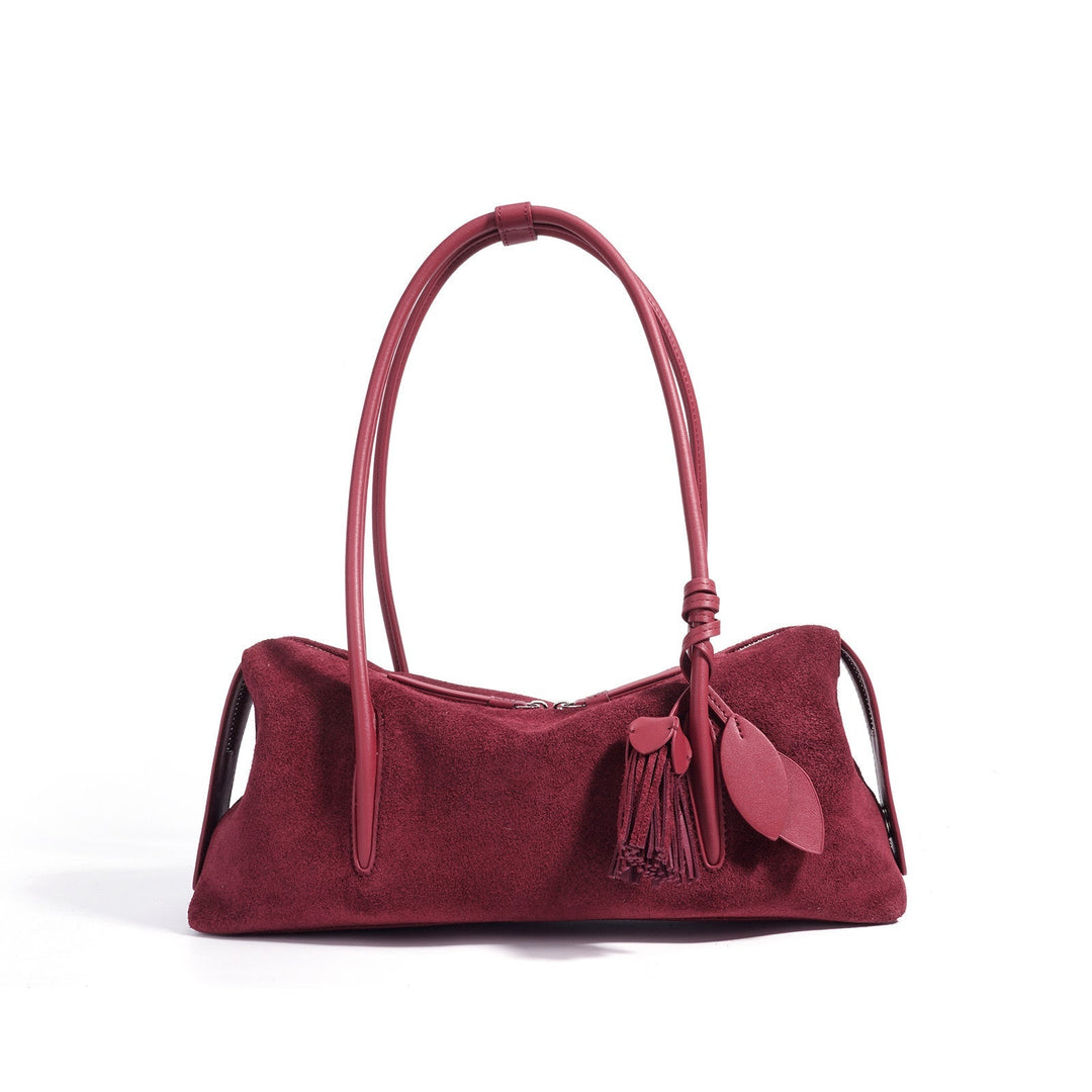 Nord Taschen | Damen Schultertasche mit Quaste und Blattanhänger Detail