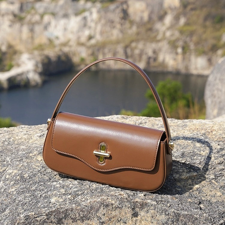 Nord Taschen | Schultertasche mit goldenem Drehverschluss und Crossbody-Tragegurt