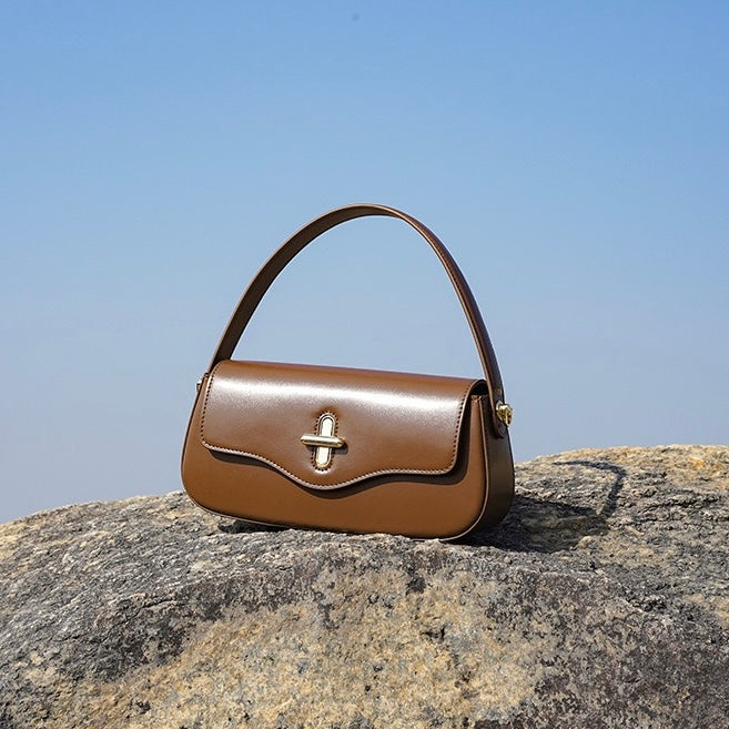 Nord Taschen | Schultertasche mit goldenem Drehverschluss und Crossbody-Tragegurt