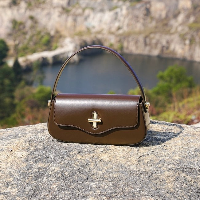 Nord Taschen | Schultertasche mit goldenem Drehverschluss und Crossbody-Tragegurt