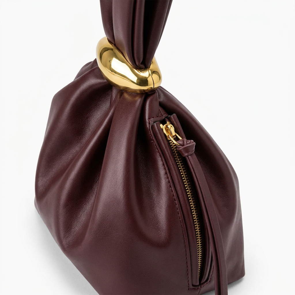 Nord Taschen | Vegane Leder Raffung Clutch Tasche mit goldener Ringgriff