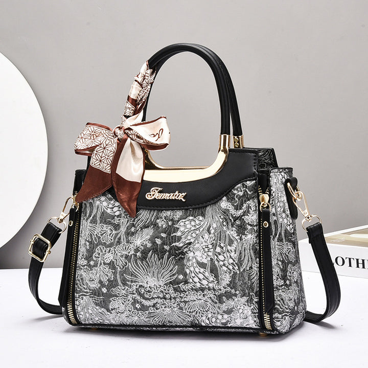 Damen elegante Handtasche mit floralem Design und Schmuckdetails Nord Taschen