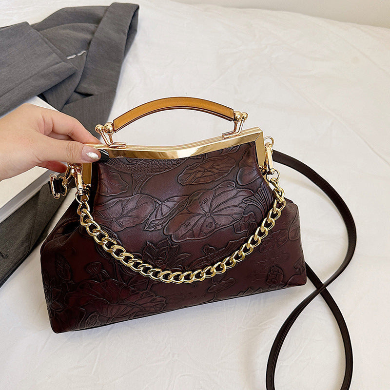 Damen elegante Handtasche mit floralem Präge-Design Nord Taschen