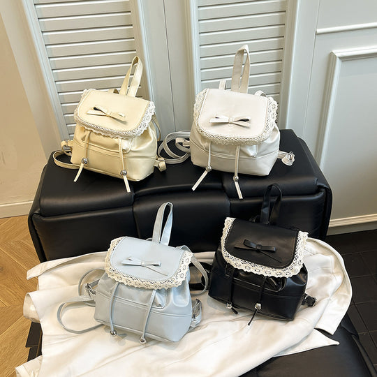 Damen Rucksackhandtasche mit romantischem Spitzenaufsatz und niedlichem Schleifenakzent Nord Taschen