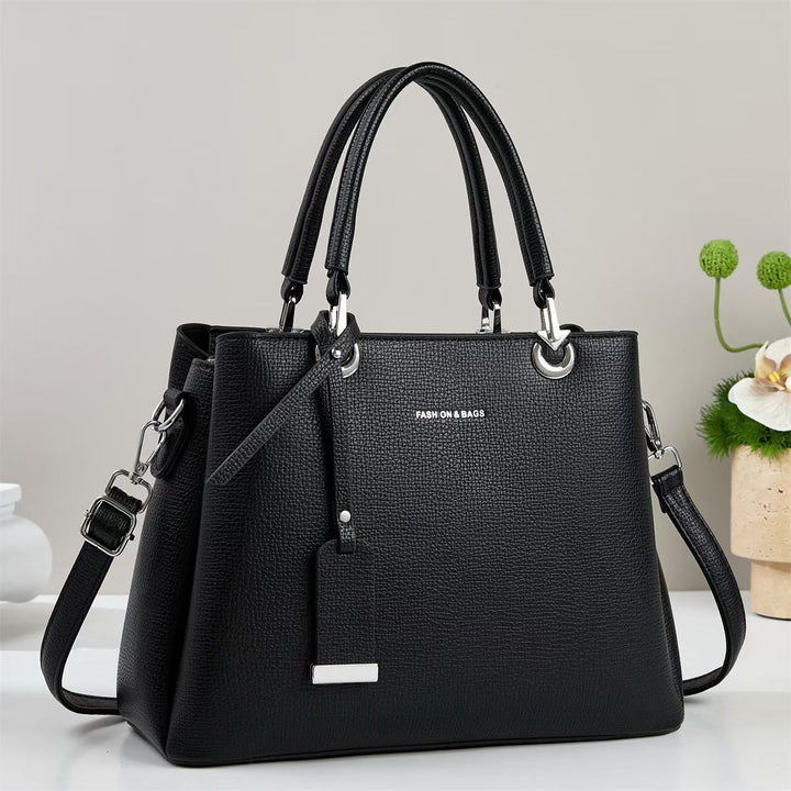 Damen elegante Handtasche mit strukturierten Akzenten Nord Taschen