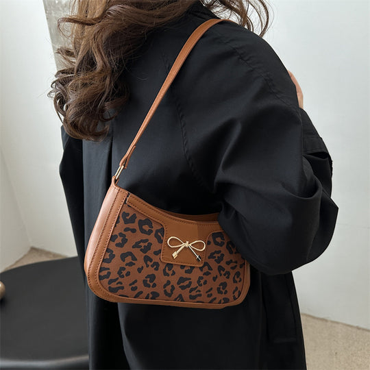 Damen Umhängetasche mit Leopardenmuster und elegantem Kettenriemen Nord Taschen