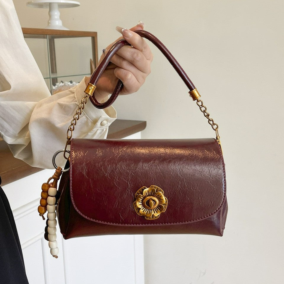 Damen elegante Umhängetasche mit floralem Verschluss Nord Taschen