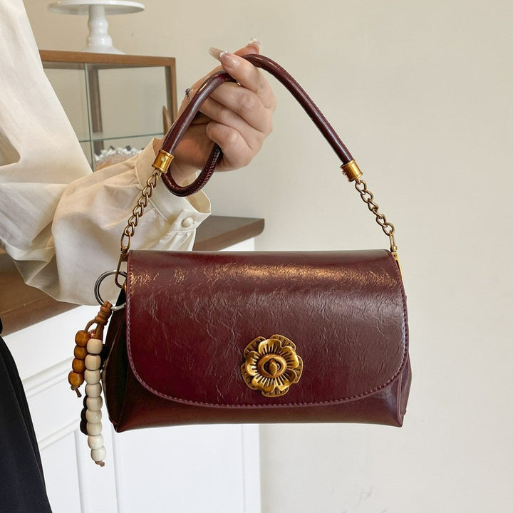 Damen elegante Umhängetasche mit floralem Verschluss Nord Taschen
