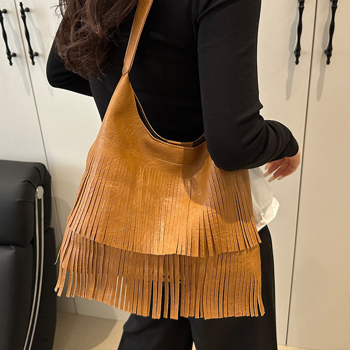 Damen Umhängetasche mit fransigem Design und robustem Tragegriff Nord Taschen