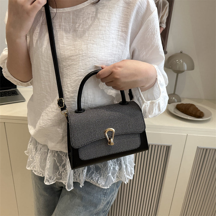 Damen elegante Handtasche mit strukturierter Oberfläche und goldenen Akzenten Nord Taschen