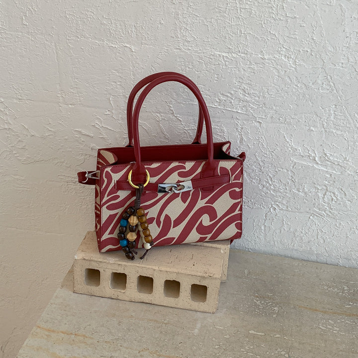 Damen Designer Handtasche mit verspieltem Kettenmuster Nord Taschen