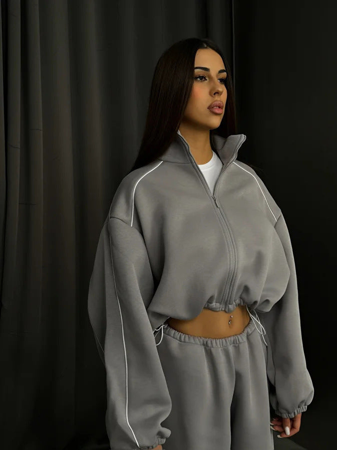 Damen cropped Zip-Kapuzenjacke mit Tunnelzug-Bund, oversized Ärmeln und kontrastierender Paspel Nord Taschen