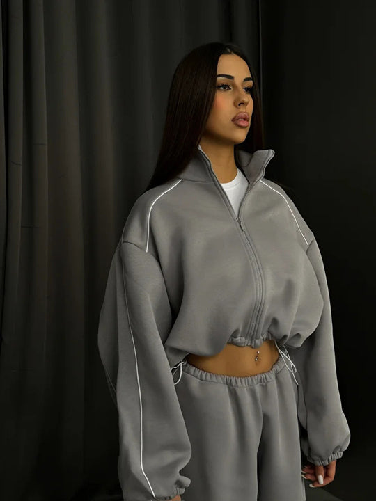 Damen cropped Zip-Kapuzenjacke mit Tunnelzug-Bund, oversized Ärmeln und kontrastierender Paspel Nord Taschen