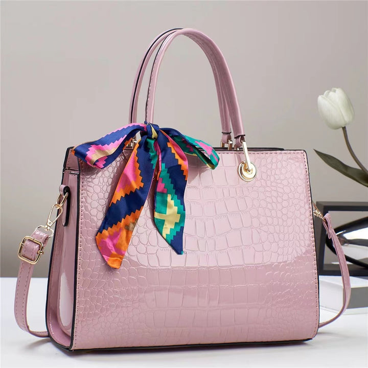 Damen elegante Handtasche mit prominenter Schlangenleder-Prägung und modischem Schal Nord Taschen