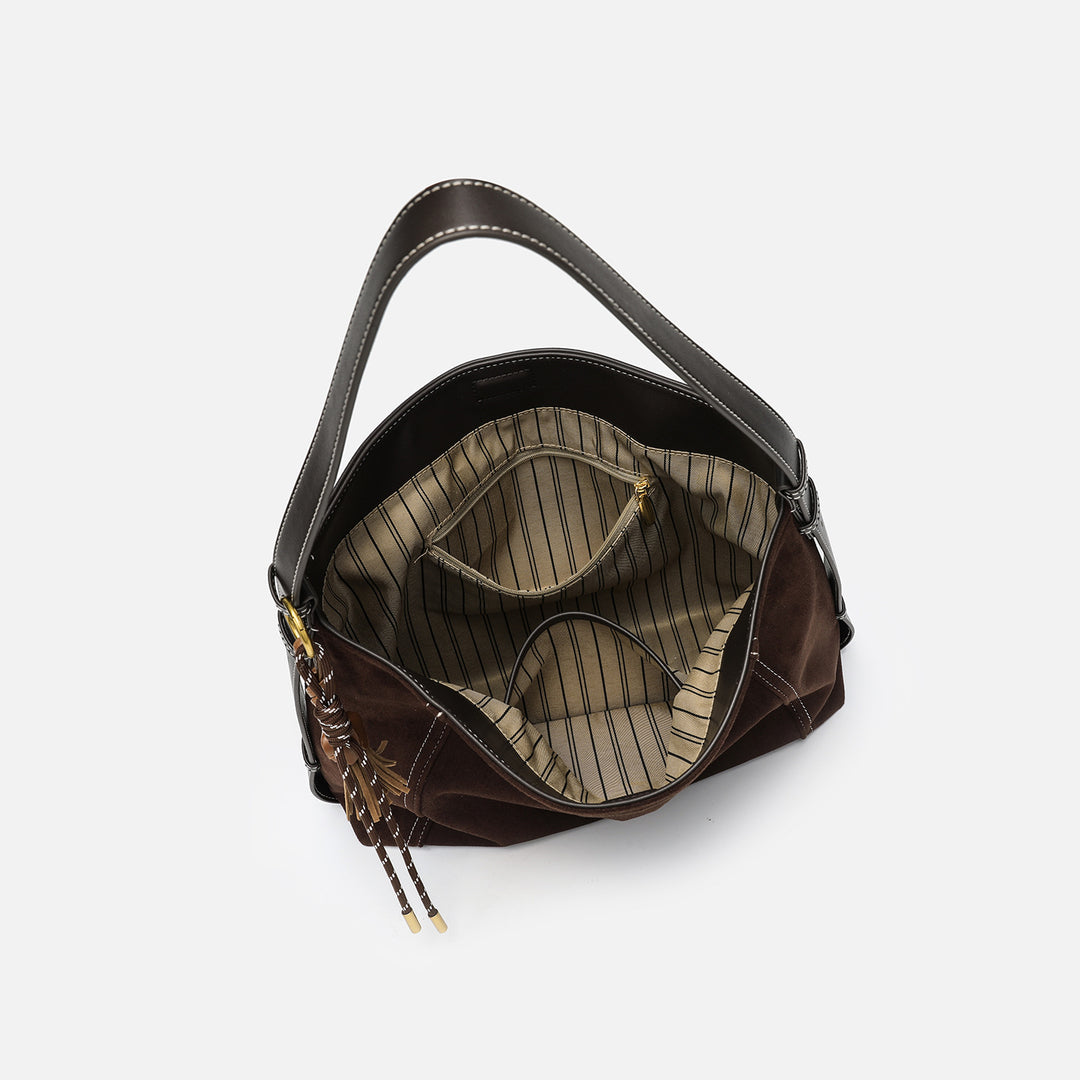 Damen Hobo Tasche mit elegantem Leder und dekorativen Quasten Nord Taschen