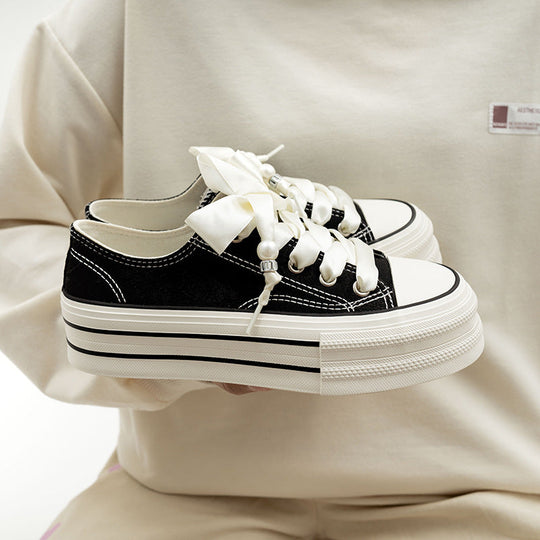 Damen Bequeme Plattform-Sneaker mit verspielten Schnürsenkeln und eleganter Oberfläche