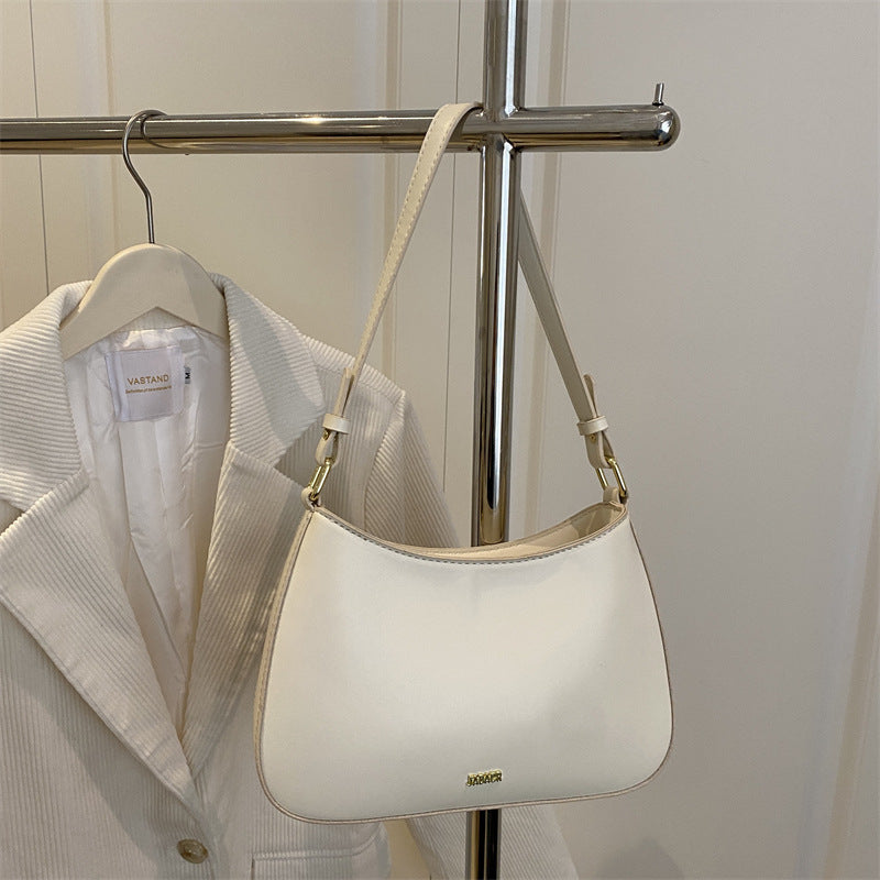 Damen elegante Umhängetasche mit geschwungenem Design und abnehmbarem Riemen Nord Taschen