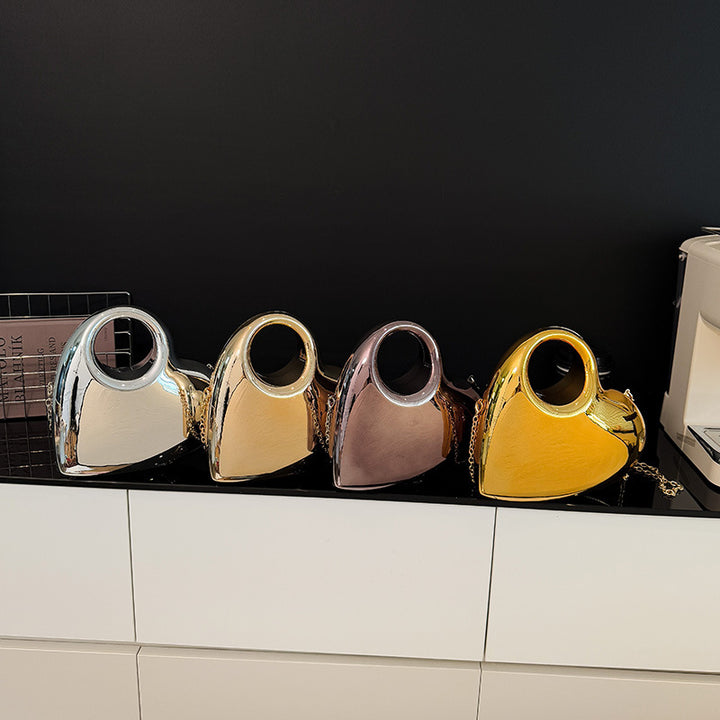 Damen herzförmige Clutch mit glänzendem Finish Nord Taschen