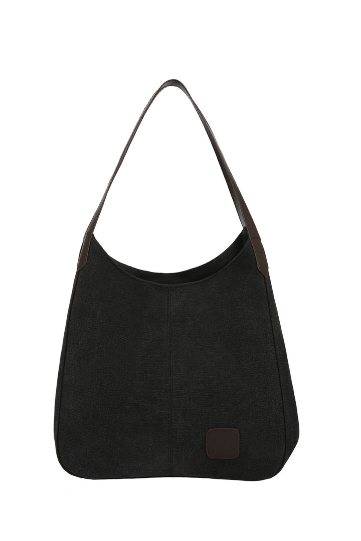 Damen Schultertasche aus strapazierfähigem Canvas mit eleganten Lederakzenten Nord Taschen