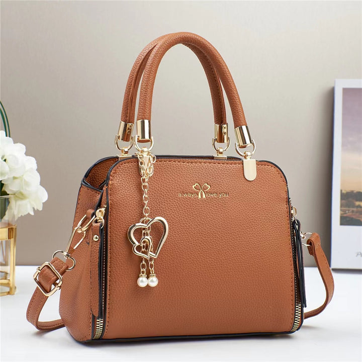 Damen strukturiertes Handtaschen-Design mit abnehmbarer Quaste Nord Taschen