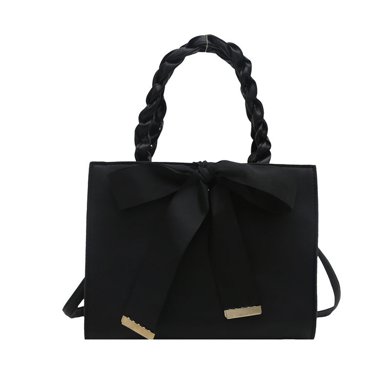 Damen elegante Handtasche mit geflochtenem Ledergriff und Schleifenakzent Nord Taschen
