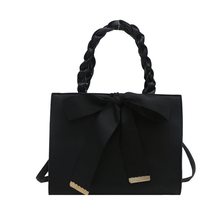 Damen elegante Handtasche mit geflochtenem Ledergriff und Schleifenakzent Nord Taschen