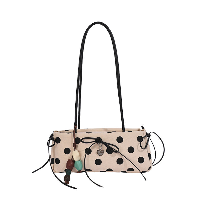 Damen Umhängetasche mit verspieltem Punktedesign und charmanten Anhängern Nord Taschen