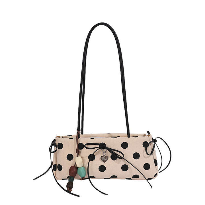 Damen Umhängetasche mit verspieltem Punktedesign und charmanten Anhängern Nord Taschen