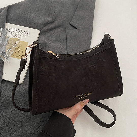 Damen Umhängetasche aus hochwertigem Kunstleder mit elegantem Reißverschluss Nord Taschen