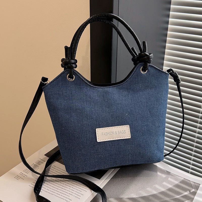 Damen Handtasche aus strapazierfähigem Denim mit eleganten Lederdetails Nord Taschen