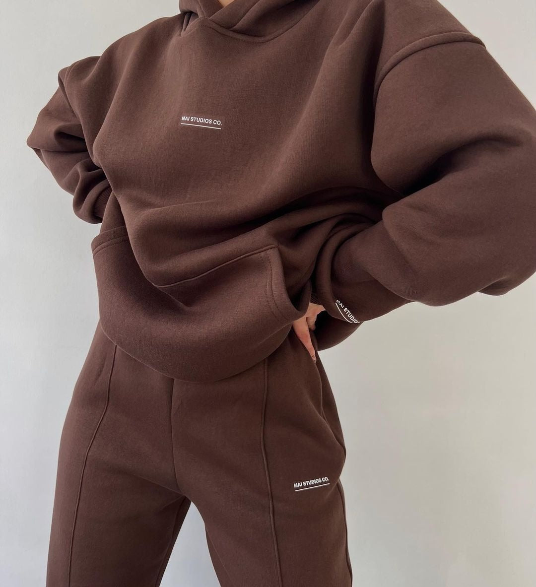Damen Set Schwere French‑Terry Oversize‑Kapuzenpullover mit Kängurutasche und Slim‑Jogginghose Nord Taschen