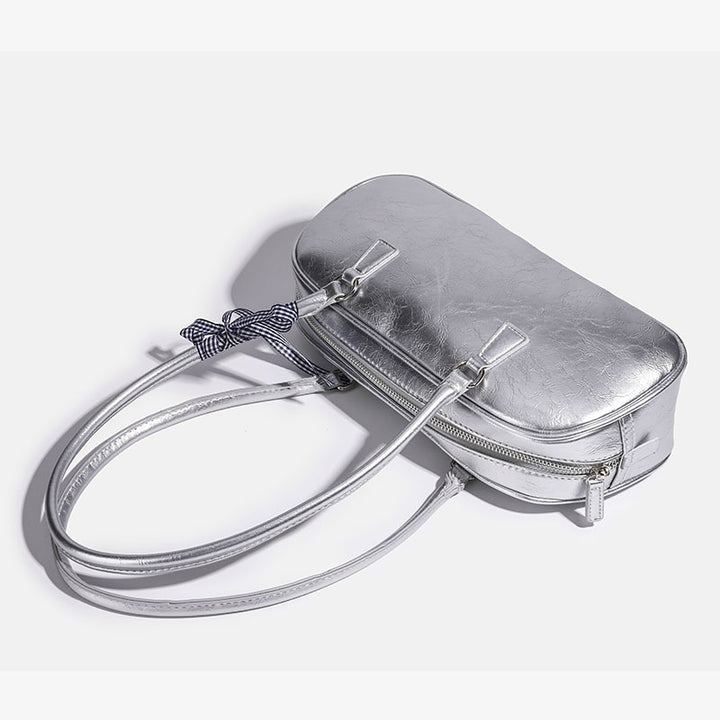 Damen Clutch mit glänzender Oberflächenstruktur und dekorativem Schleifenakzent Nord Taschen