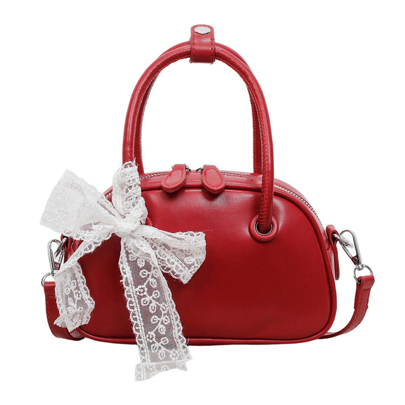 Damen elegante Handtasche mit verspieltem Spitzenanhänger Nord Taschen