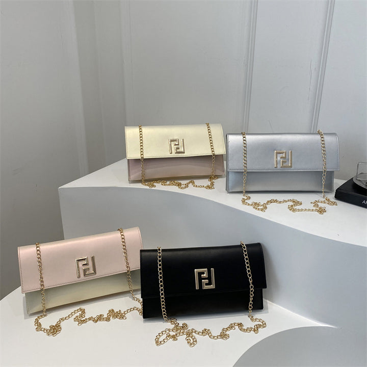 Damen elegante Clutch Tasche mit Kettenverzierung Nord Taschen