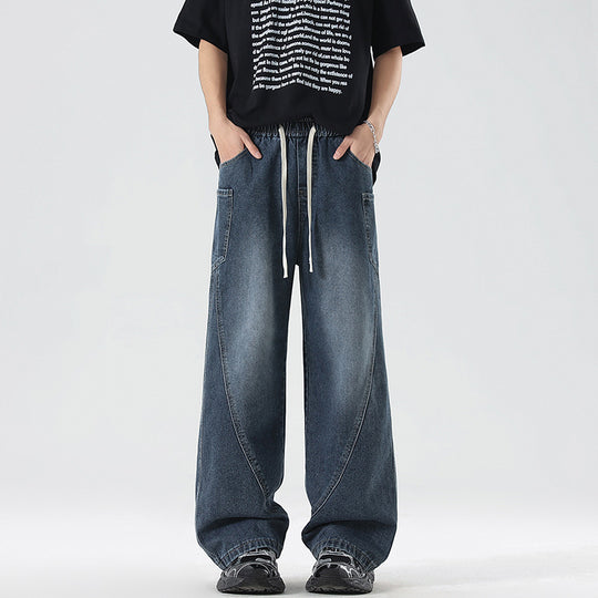 Herren Extraweite Denim-Baggyhose mit Tunnelzugbund und Paneelnähten Nord Taschen
