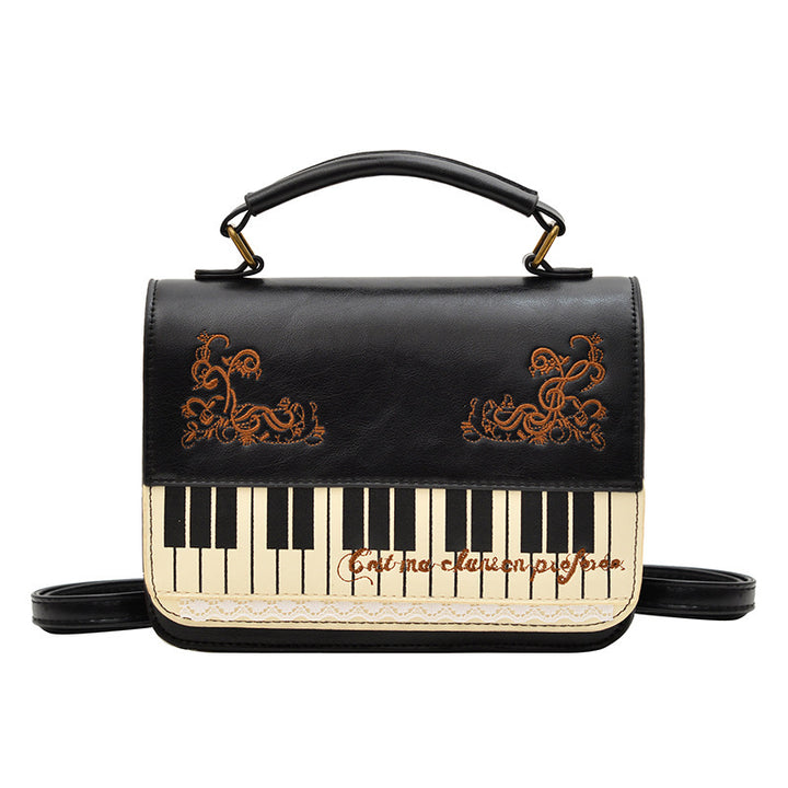 Damen Handtasche mit Klaviermotiv Nord Taschen