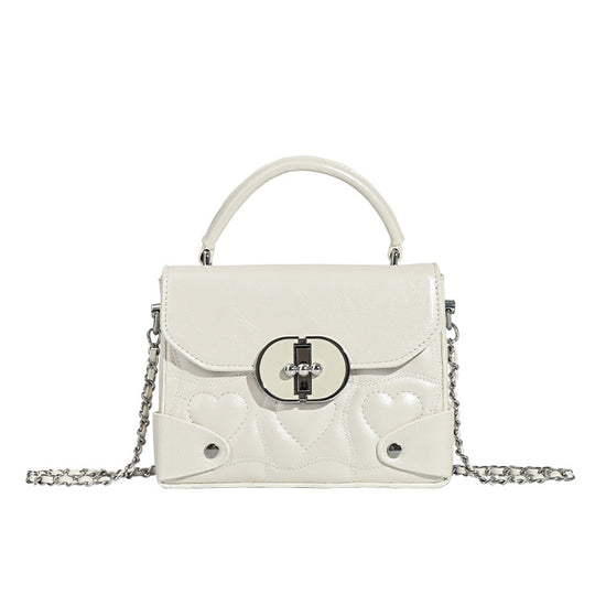 Damen Handtasche mit herzförmigem Design und schickem Kettenriemen Nord Taschen