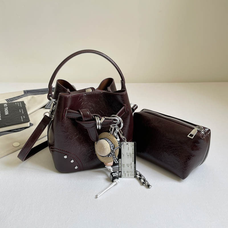 Damen stilvolle Mini-Beuteltasche mit abnehmbarem Kosmetiktäschchen Nord Taschen
