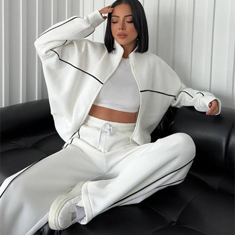 Damen lässiges Sweatset mit Stehkragen Reißverschluss gekürzter Jacke und hochtaillierter Schlaghose Nord Taschen