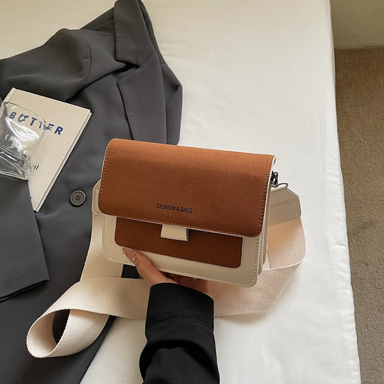 Damen Umhängetasche mit innovativem Klappverschluss und hochwertigen Akzenten Nord Taschen
