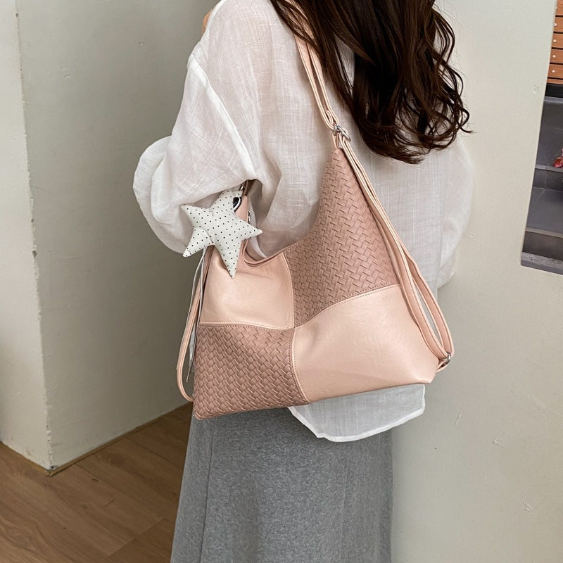 Damen Beuteltasche aus kunstvoll geflochtenem Leder mit elegantem Design Nord Taschen