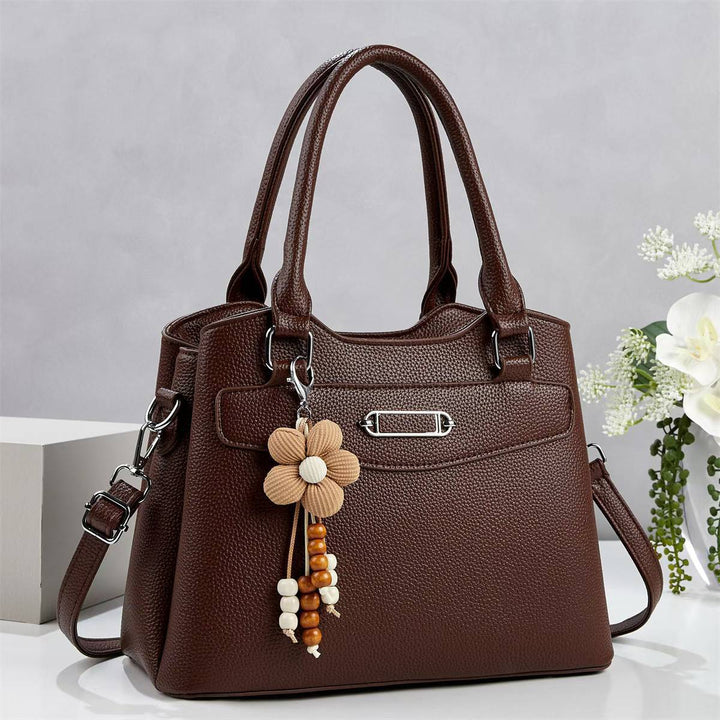 Damen elegante Handtasche mit abnehmbarem Blumen-Anhänger Nord Taschen